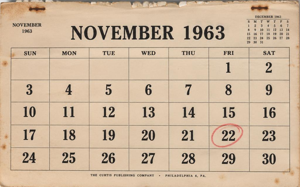 A weathered November 1963 tear-off calendar page with the 22nd circled